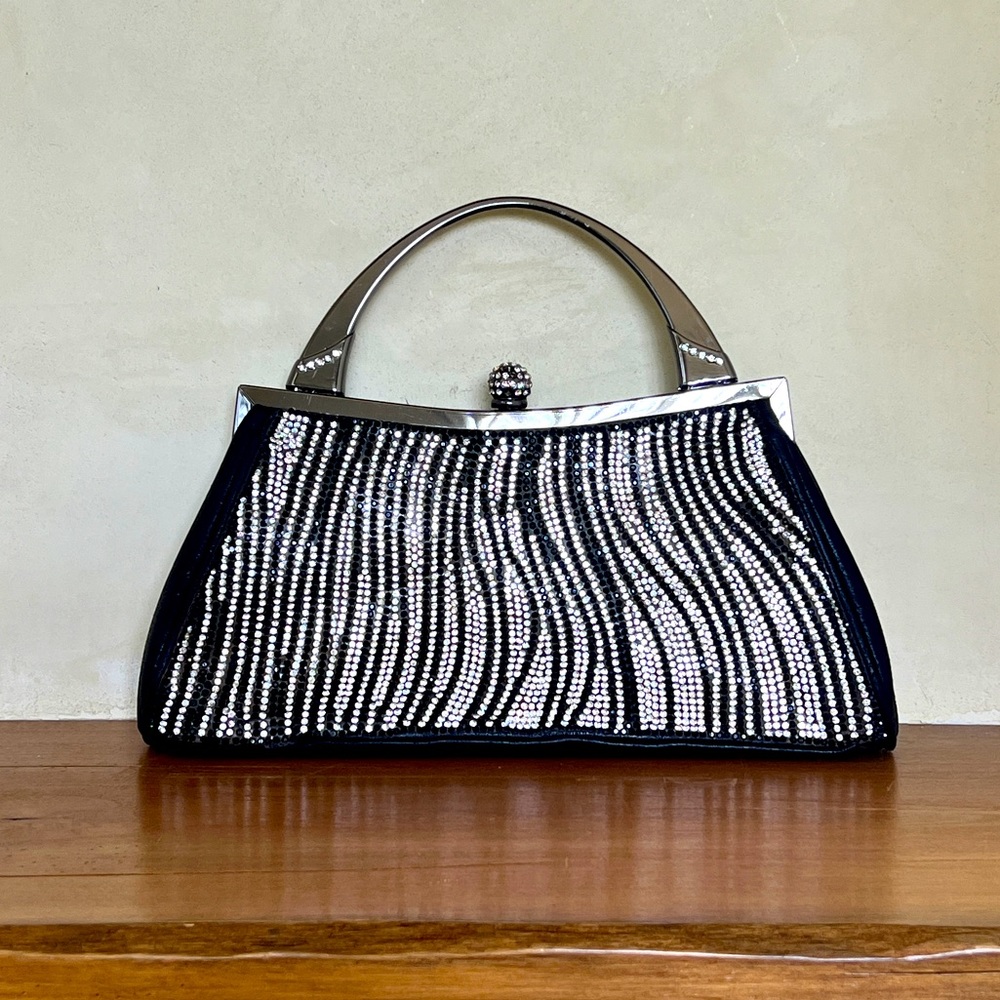Leather zebra encrusted handbag with silver metal handle